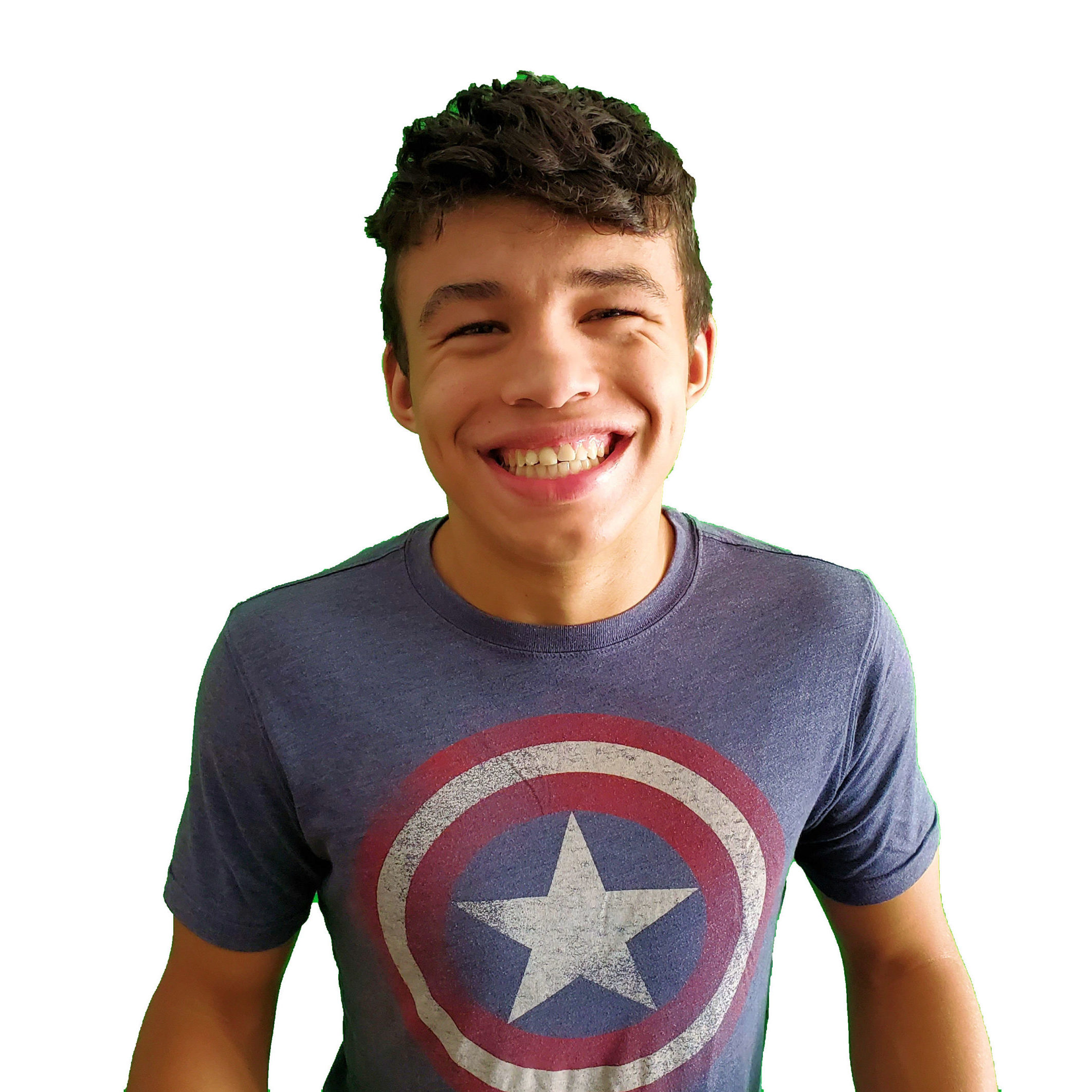 Alexander smiling at the camera wearing a Captain America T-shirt.